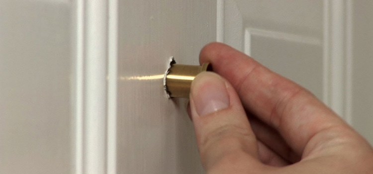 peephole door repair in Corcoran